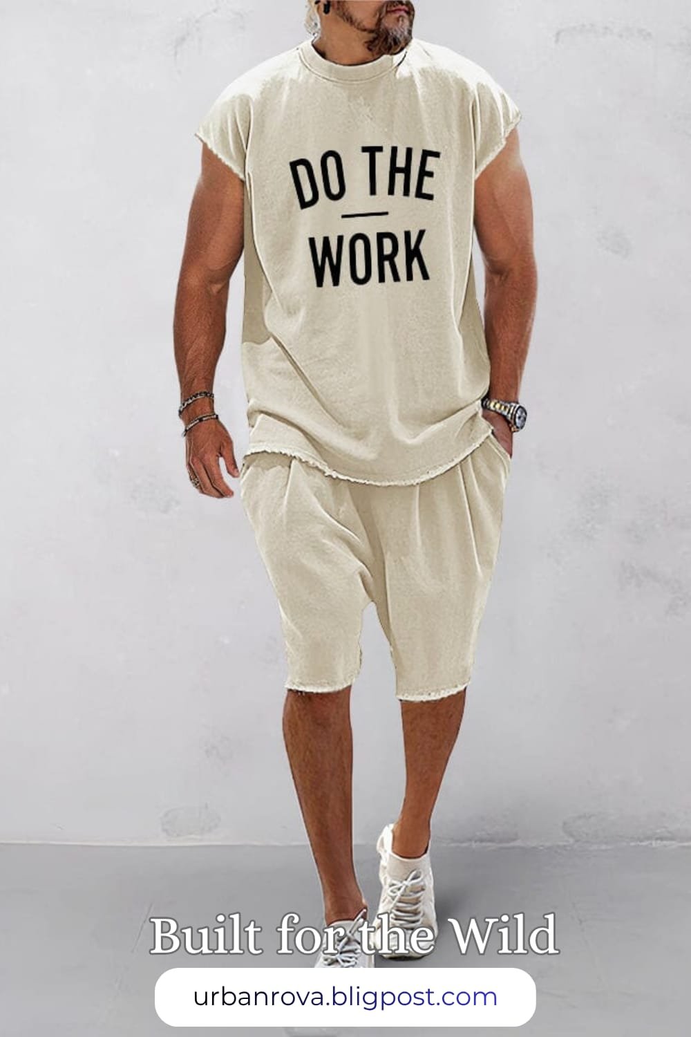 COOFANDY Casual Loose Fit Word Printed Sports Set – Summer 2026 Style A man wearing a COOFANDY loose-fit printed sports set for a trendy and comfortable summer look.