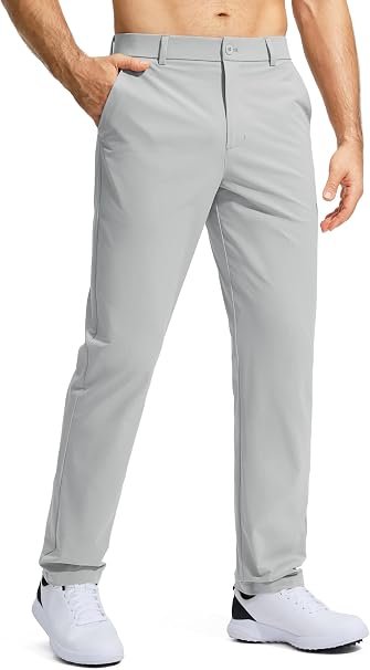 Pudolla Men's Lightweight Stretch Golf Dress Pants Man wearing Pudolla bright gray lightweight stretch golf dress pants paired with white sneakers.