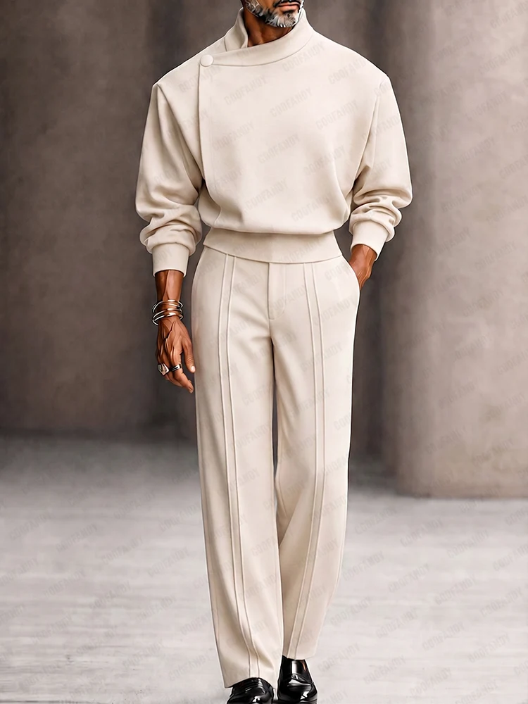 A fashion model wearing a beige Modern Boxy Fit Shoulder Pad Top Pants Set from Coofandy, featuring a boxy pullover top with shoulder pads and tailored crease-line trousers, highlighting an upscale men's Streetwear Style outfit for urban daily wear.