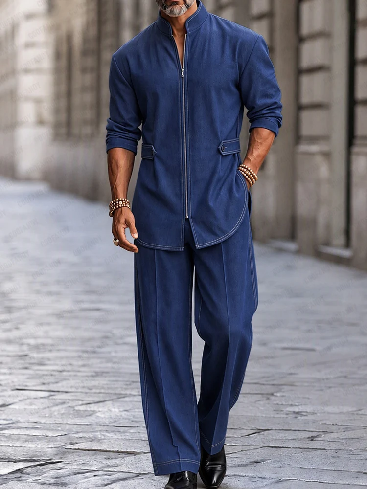 A fashion model wearing a blue Modern Streetwear Zip-Up Jacket & Pants Set from Coofandy, featuring a stand collar, zip-up closure, and cinched waist, highlighting a refined men's Streetwear Style outfit for urban daily wear.
