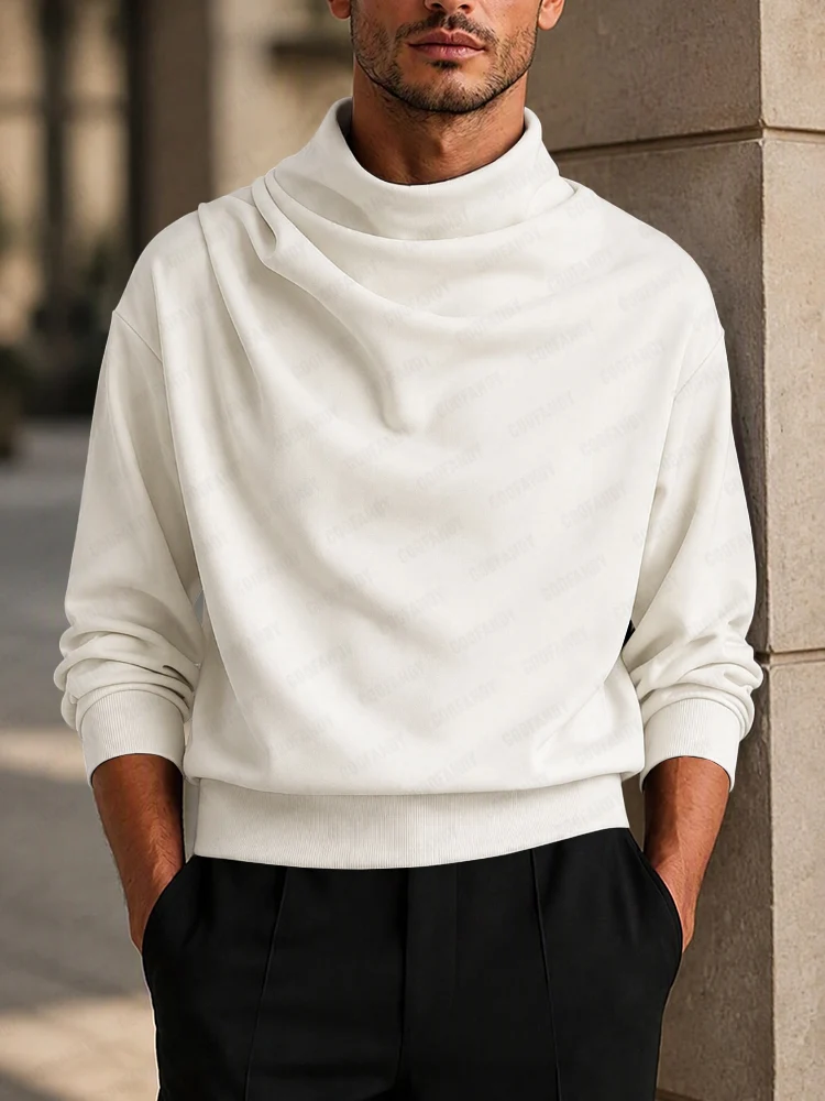 A fashion model wearing a white Ultra-Soft Stretch Draped Mock Neck Top from Coofandy, featuring an elegant draped mock neck collar and long sleeves, highlighting a sophisticated men's Streetwear Style outfit for urban daily wear.